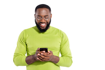 Portrait of concentrated lovely guy holding gadget reading news having eyewear eyeglasses isolated...