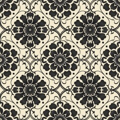 A floral pattern featuring intricate black and beige designs.