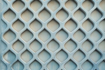 Stunning Architectural Detail: A Study in Geometric Pattern and Texture on a Light Gray Wall
