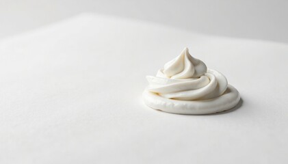 Single dollop of whipped cream on plain paper, white, simple