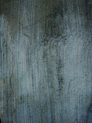 A wall with a blue and white striped pattern