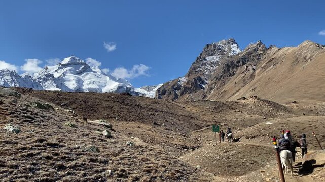 Pilgrims travel on horse back to Gauri Kund at base of Adi Kailash, uttarakhand. Adi Kailash is the second most important peak of Panch Kailash group