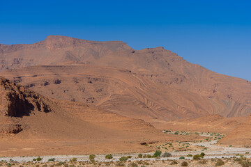 Dry wadi (river) of the Moroccan countryside near the Atlas Mountains
