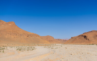 Dry wadi (river) of the Moroccan countryside near the Atlas Mountains
