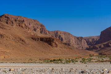 Dry wadi (river) of the Moroccan countryside near the Atlas Mountains
