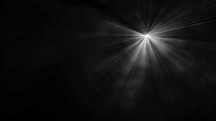 Starburst light rays on a black background