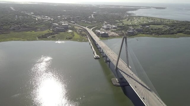 Aerial view of Ravenel Bridge connecting Charleston, South Carolina and Mt Pleasant, South Carolina with Mt Pleasant in background.
