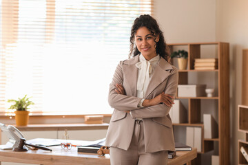 Portrait of female African-American lawyer in office
