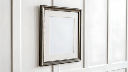 A vintage-style photo frame sits beside a vibrant bouquet of colorful flowers, creating a warm and inviting scene.