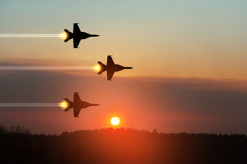 Air Force Day. Aircraft silhouettes on background of sunset.