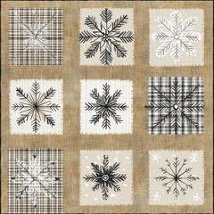 A cozy quilt pattern featuring black and white snowflake designs in a textile style.