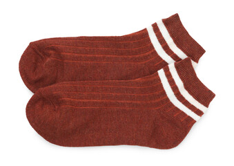 Pair of soft socks isolated on white, top view