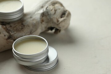 Natural solid perfume and snag on white background, closeup. Space for text