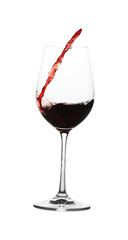 Tasty wine splashing in glass on white background
