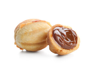 Sweet walnut shaped cookies with boiled condensed milk on white background