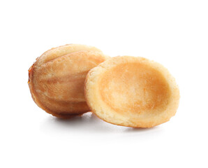 Sweet walnut shaped cookies with boiled condensed milk on white background