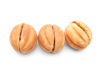 Sweet walnut shaped cookies with boiled condensed milk on white background