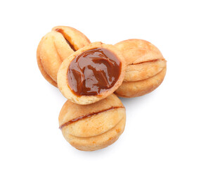 Sweet walnut shaped cookies with boiled condensed milk on white background