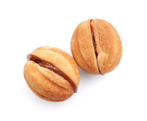 Sweet walnut shaped cookies with boiled condensed milk on white background