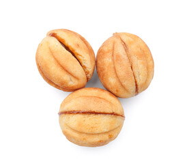 Sweet walnut shaped cookies with boiled condensed milk on white background