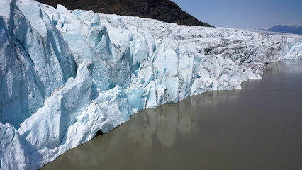 Aerial view of the ice cliffs in the front part of the Fjallsjokull glacier in southeast Iceland.  © Jose Lledo