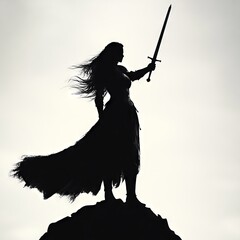 Silhouette of a female warrior holding a sword