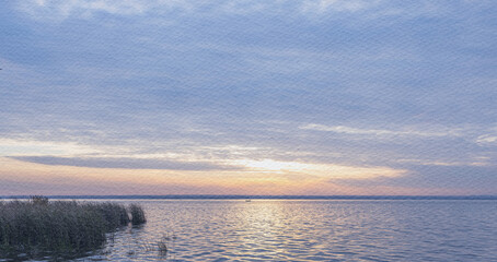 Calm lake with a beautiful sunset in the background