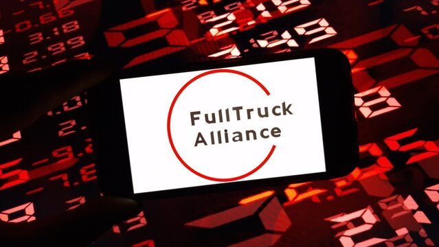 Konskie, Poland - December 24, 2024: Full Truck Alliance company logo displayed on mobile phone