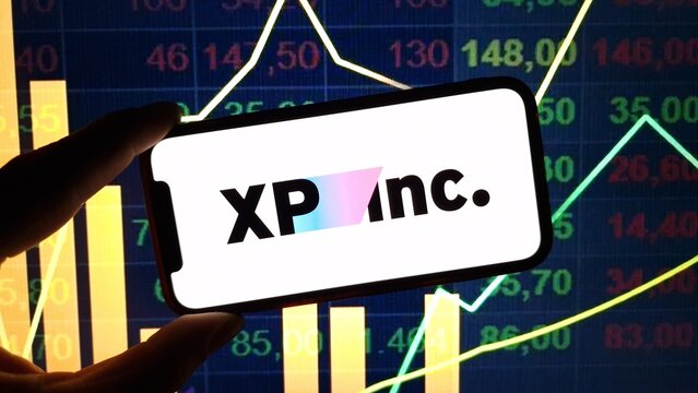 Konskie, Poland - December 24, 2024: XP Inc company logo displayed on mobile phone
