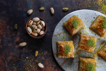 Turkish-style pistachio baklava with a glass of milk.