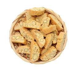 Traditional Italian almond biscuits (Cantucci) in bowl isolated on white, top view