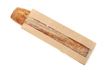 Fototapeta premium Fresh baguette in paper bag isolated on white, top view