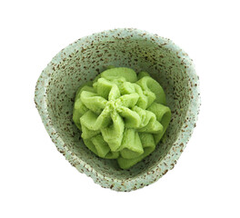 Hot wasabi paste in bowl isolated on white, top view