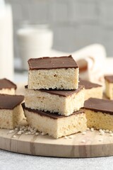 Delicious puffed rice bars on gray table, closeup