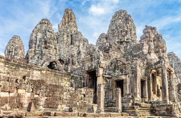 Naklejka premium Ancient Bayon temple with carved stone faces, Angkor Thom, Siem Reap, Cambodia