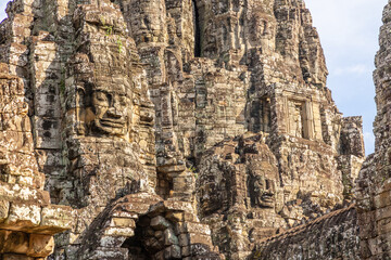 Ancient Bayon temple with carved stone faces, Angkor Thom, Siem Reap, Cambodia