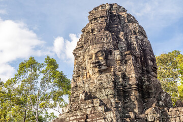 Fototapeta premium Ancient Bayon temple with carved stone faces, Angkor Thom, Siem Reap, Cambodia