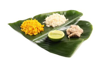 Cut banana leaf with different food isolated on white. Healthy eco serving