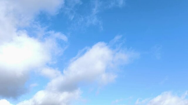 Beautiful landscape of clear blue sky with white clouds circulating