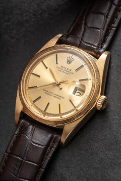 Rolex Datejust watch. 18kt yellow gold watch with Morelli bezel on dark background. Milan. Italy_ August 22, 2024