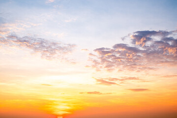 Sky,sunset, beautiful , luxury soft gradient orange gold clouds and sunlight on the blue sky perfect for the background, Sunrise on morning or everning in winter warm time ,Twilight summer,silhouette