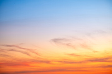 Sky,sunset, beautiful , luxury soft gradient orange gold clouds and sunlight on the blue sky perfect for the background, Sunrise on morning or evening in winter warm time ,Twilight summer,silhouette