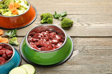 Pet food. Natural products on wooden table, closeup