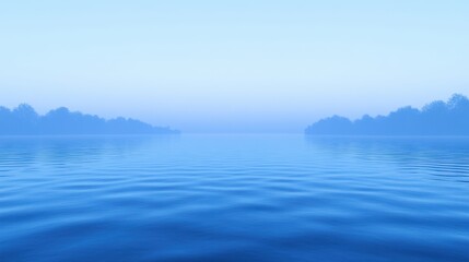 Fototapeta premium Serene Blue Mist Over Calm Water at Dawn with Gentle Ripples and Reflection