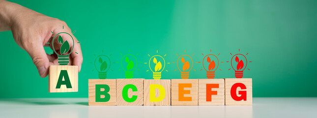 Energy efficiency rating labels promoting low consumption and efficient products to reduce carbon footprint.