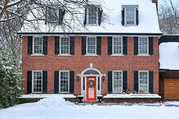 Traditional brick house in winter