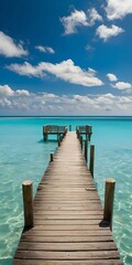 Obraz premium Wooden Pier Extending into the Turquoise Ocean