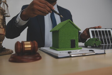 Auctioneer knocks down property sale by sample house and lawyer's gavel, judge mediates in property...