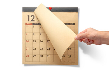 壁掛けの月めくりカレンダー。12月、年末、年の瀬のイメージ