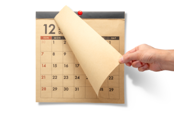 壁掛けの月めくりカレンダー。12月、年末、年の瀬のイメージ